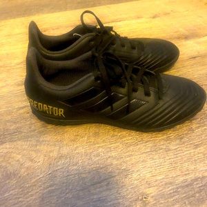 Indoor soccer shoes worn one time. Size 5